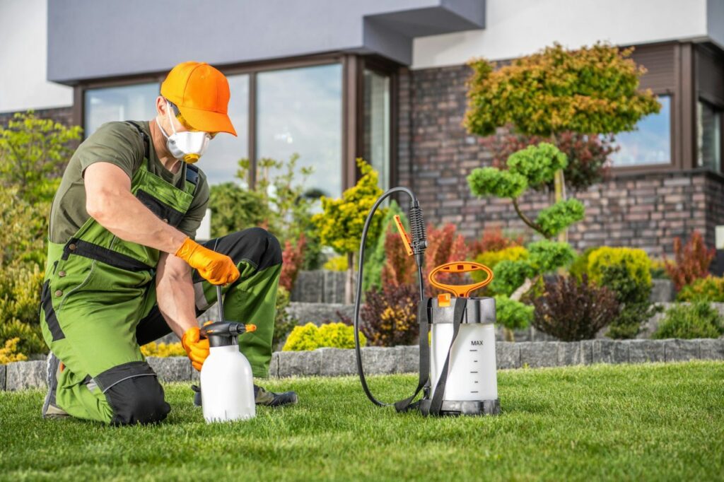 landscaper-preparing-to-perform-pest-control-treatment.jpg